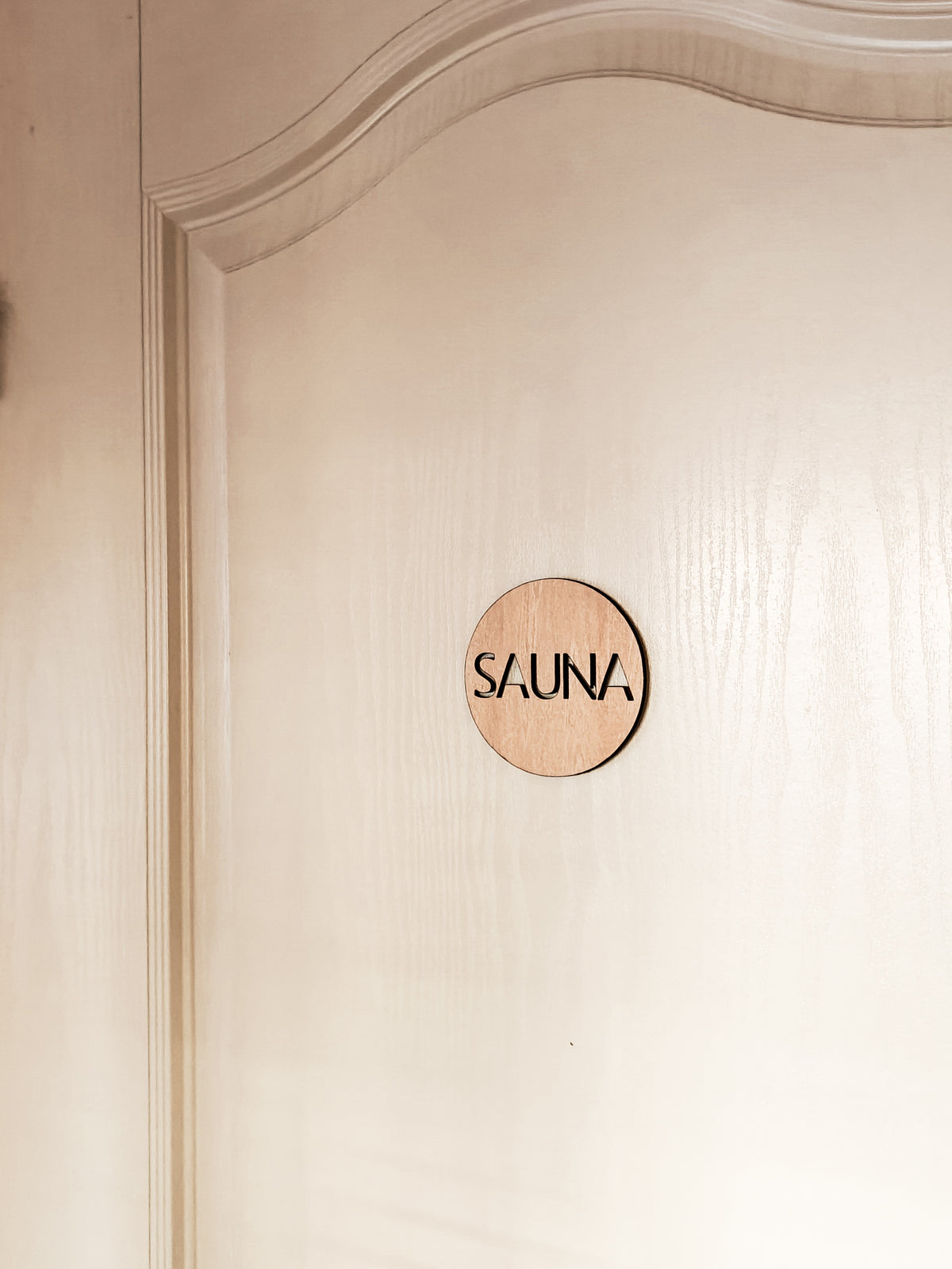 Pyöreä sauna kyltti