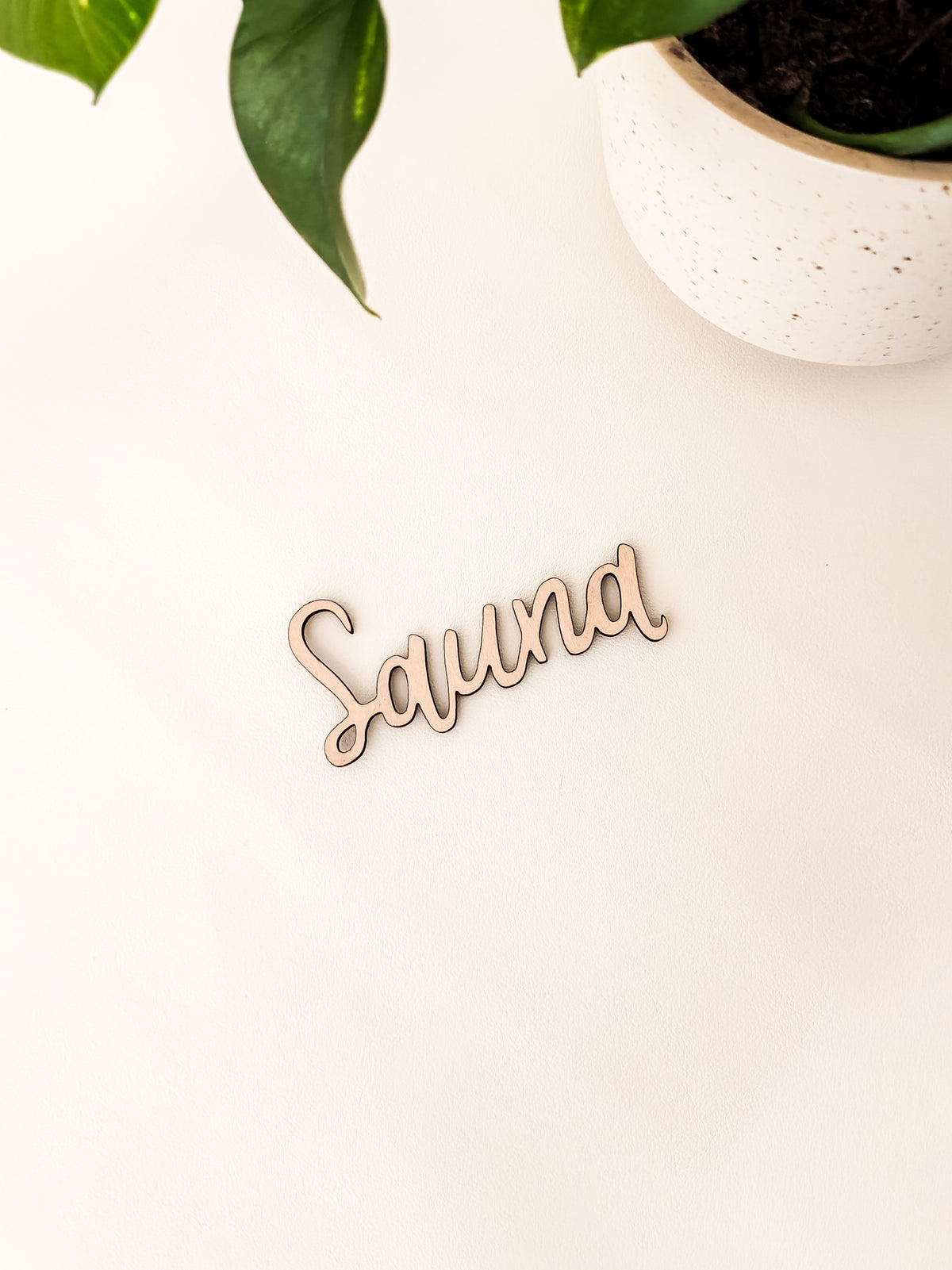 Sauna kyltti
