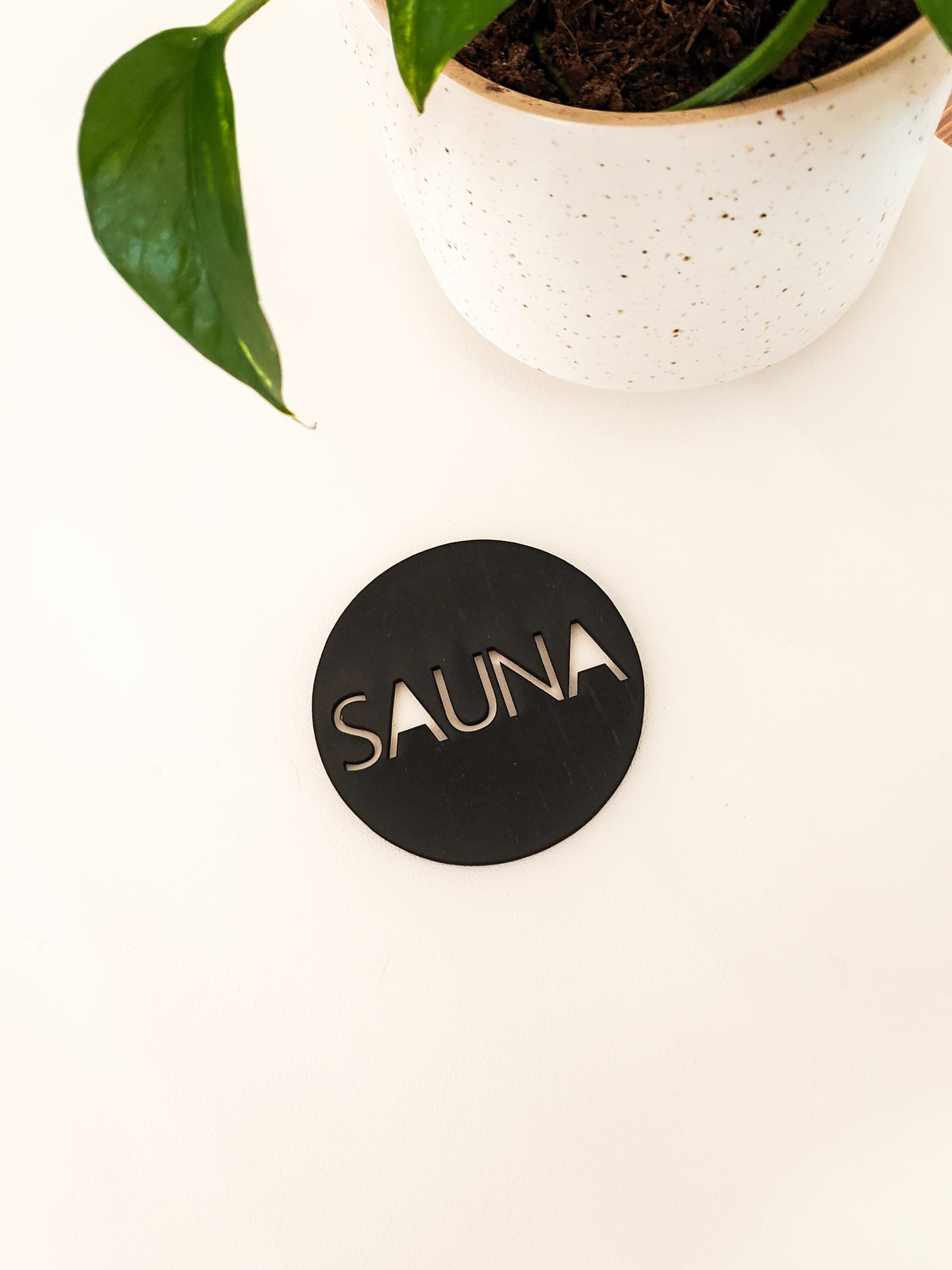 Pyöreä sauna kyltti