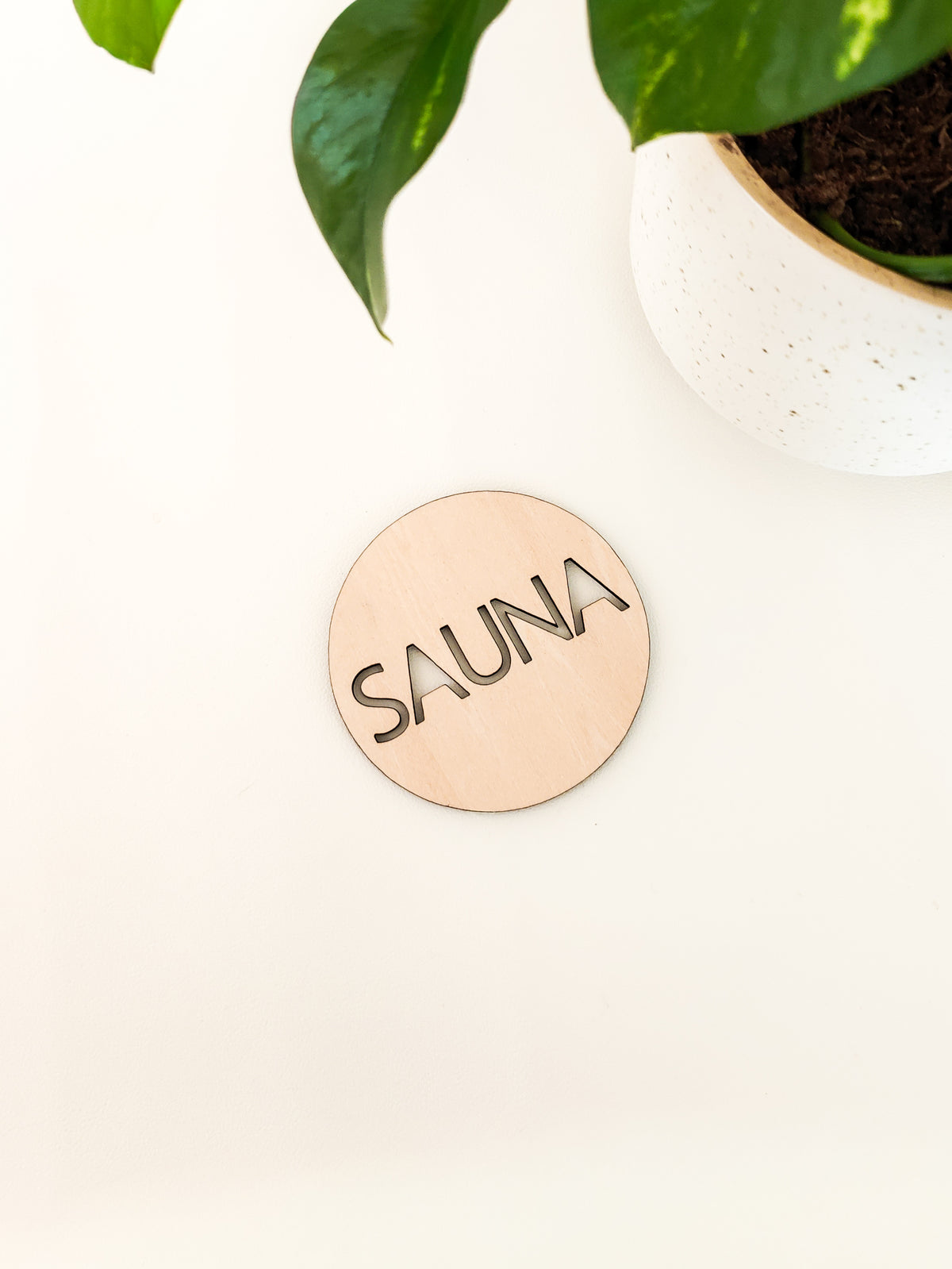 Pyöreä sauna kyltti